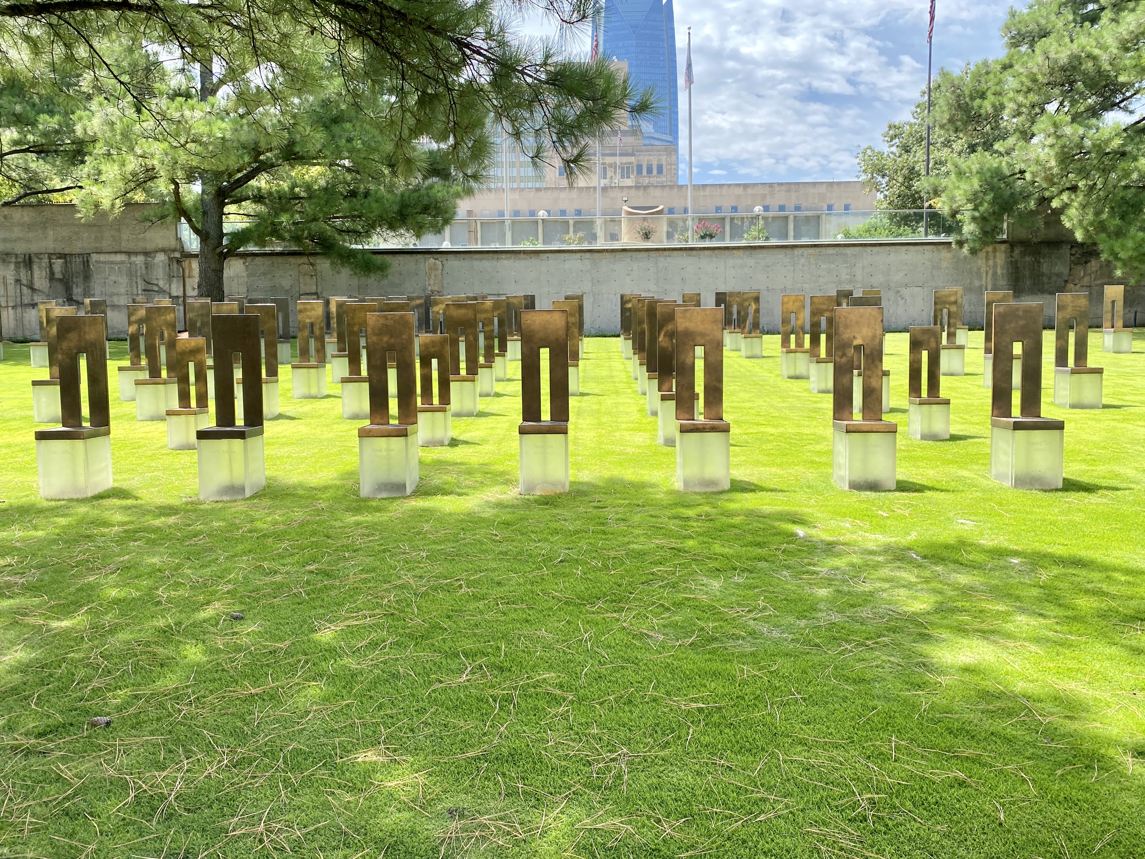 Built in 1997-2004, this Contemporary memorial was designed by Butzer Design Partnership, incorporating the Brutalist plaza and parking garage of the former Alfred P. Murrah Federal Building, which was built in 1977 and designed by Locke, Wright and