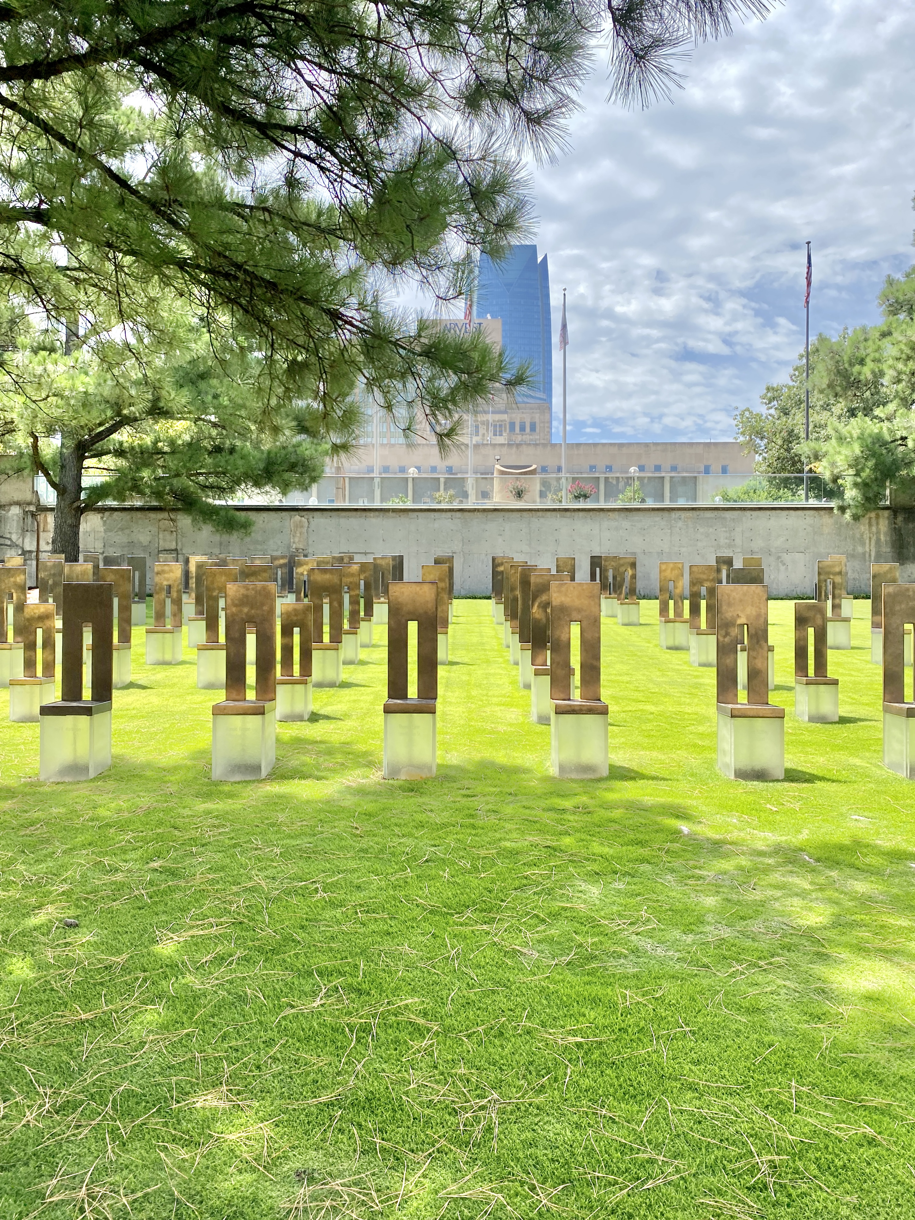 Built in 1997-2004, this Contemporary memorial was designed by Butzer Design Partnership, incorporating the Brutalist plaza and parking garage of the former Alfred P. Murrah Federal Building, which was built in 1977 and designed by Locke, Wright and