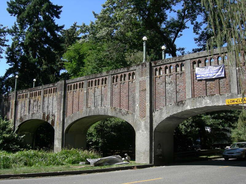 Footbridge in Washington Park Arboretum, Seattle, Washington, bridging Lake Washington Blvd., listed in the National Register of Historic Places. Looking roughly northwest.