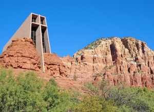 The Chapel of the Holy Cross is a Roman Catholic chapel built from 1954 to 1956 into the red rock buttes of Sedona, Arizona, within the Coconino National Forest. It was inspired and commissioned by local rancher and sculptor Marguerite Brunswig