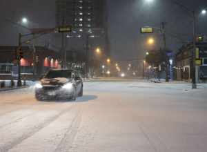 A car driving in the Dallas snow 2021