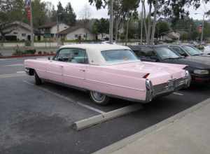 A pink Cadillac, just like in the movies... And a solid pink, unlike the metallic mauve used by Mary Kay saleswomen.

This car has a few battle scars but is otherwise in mint condition. Even the white leather interior is in excellent condition