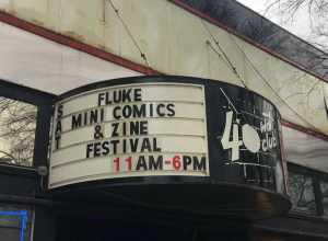 The banner outside the 40 Watt Club in Athens, Georgia in 2018, advertising the annual FLUKE Mini-Comics &amp; Zine Festival.