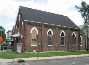 Front and western side of the Church of Jesus Christ Apostolic Faith, located at 701 E. McCarty Street in Indianapolis, Indiana, United States.  Built in 1872, it was originally home to the first Danish Lutheran church in the United States.  Today,