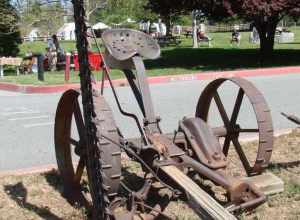 (1 in a multiple picture set)
This sickle, also called a hay mower, was one of the most labor saving inventions for farmers.  Now they could ride behind a team and cut a field of hay in less than a day.  The piece sticking up is the sickle bar and