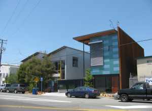 Modern houses on Folger Avenue, Berkeley, California. The house on the right, with the blue and green facade, was constructed in 2008.