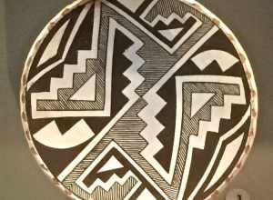 Small decorative plate with a classic Chaco--style design. On display at Museum of Northern Arizona, Flagstaff