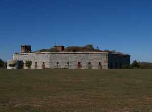 Historic Fort Rodman, New Bedford, Massachusetts. The lantern of Clarks Point Light is barely visible over the right center of the fort.