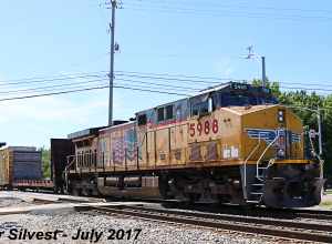 Union Pacific 7394(AC45CCTE), 8494(SD70ACe), 5801(AC44CWCTE), 8925(SD70AH) and 5988(AC44CWCTE) Leading a Southbound 9,169 feet Manifest on the BNSF Fort Scott Sub before passing over the Pflumm Road Crossing south of Santa Fe Trail Drive in Lenexa,