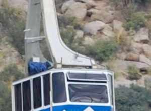 Sandia Peak Tramway car ascending.  Taken using 55-200 mm f/4-5.6G ED AF-S DX Zoom-Nikkor Lens.