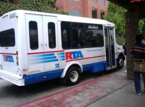 An El Dorado van, #8430, stops briefly at the Downtown Terminal before serving route 204 to Montclair.