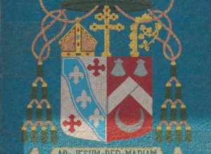 Archbishop James Byrne's coat of arms above the main entrance into St. Raphael's Cathedral in Dubuque, Iowa.