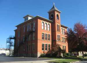 Front and western side of St. Mary's Catholic School, located at 320 Middle Avenue in Elyria, Ohio, United States.  Built in 1906, it is listed on the National Register of Historic Places, and it is part of a Register-listed historic district, the