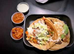 Surf and turf taco and seafood taco at Tacos El Gordo in Chula Vista, California