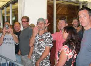 People stand in line outside Toad's Place concert hall in New Haven, CT on 8/6/13 to see Ted Nugent. A protest event was held outside in response to inflammatory remarks made by Ted Nugent regarding the shooting of Trayvon Martin.