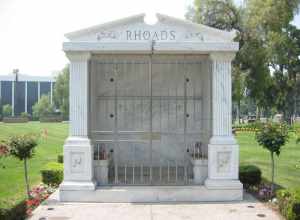 Tomb of Randy Rhoads. Photo taken on 8 May, 2006 in San Bernardino, California.
I am the author of this photograph and I hereby release it into the public domain.

Note the lipstick "kisses" all over the tomb.