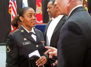 SANDY SPRINGS, Feb. 13, 2013  - Georgia Army Guard Pfc. Brittany Wynn, a wheel maintenance specialist with Marietta's 165th Quartermaster Company - and a small package sorter for UPS at its Pleasantdale Road facility - gets a word of appreciation for
