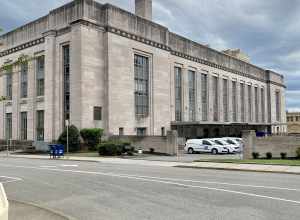 Built in 1932-34, this Art Deco, Art Moderne, and Stripped Classical Revival-style Post Office and Federal Building was designed by Baumann and Baumann to replace the earlier Old Custom House and Post Office in Downtown Knoxville on Market Street,