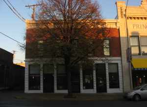 Front of the former Faris Market, located at 208 N. Walnut Street in downtown Bloomington, Indiana, United States.  Built in 1895 and now the home of the Tallent restaurant, it is part of the Courthouse Square Historic District, a historic district