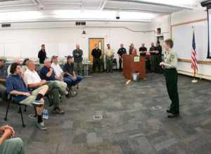 U.S. Department of Agriculture (USDA) Secretary Sonny Perdue and Interior Secretary Ryan Zinke, U.S. Senator Steve Daines and U.S. Congressman Greg Gianforte, are briefed by USDA Forest Service Regional Forester Leanne Martin, at the Coordination