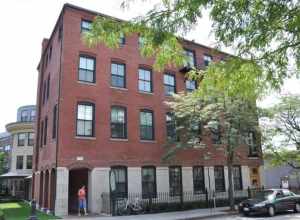 A photograph of the historic Ritchie Building in Brookline, Massachusetts.