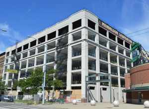 Front and eastern side of the Delco Building (previously a warehouse, being converted into apartments), located at 329 E. First Street (State Route 4) in downtown Dayton, Ohio, United States.  Built in 1915, it is listed on the National Register of