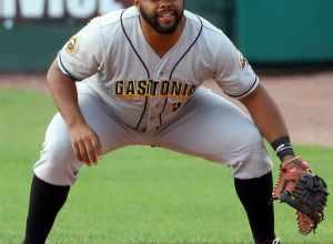 Jason Rogers playing first base for the Gastonia Honey Hunterys during a game at Clipper Magazine Stadium, Lancaster, PA, July 10, 2021.