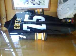 Closeup of Joe Greene's Jersey and bobble head in the Heinz Field Walk of Fame.