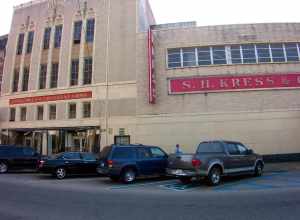 Built in 1934, this three-story Art Deco building has facades on Fifth and Sixth streets. Designed by Edward F. Sibbert, it 
is typical of his work in the early 1930s. The facade is pale brick and terracotta with darker polychrome terracotta