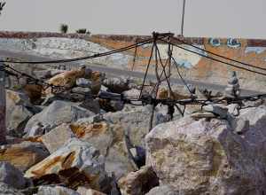 These rocks are at the bottom of the Galveston seawall near where 61st Street runs into Seawall Blvd. Hurricane Ike had pretty much wiped out the beach along the seawall, so Galveston imported a jillion or so tons of sand to replenish the beach.