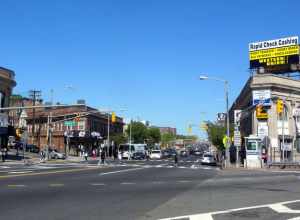 Looking east across Clinton Avenue and along Springfield Avenue (County Road 603) in the middle of town on a sunny midday.