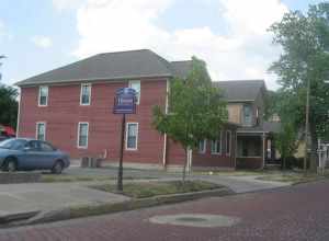 Houses on the northern side of the 100 block of E. State Street in Elkhart, Indiana, United States.  This block is part of the State Street-Division Street Historic District, a historic district that is listed in the National Register of Historic