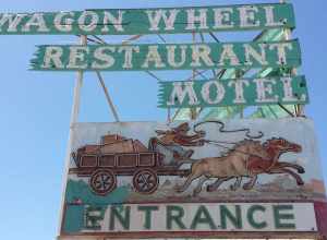 Sign for the Wagon Wheel Motel in Oxnard, California, in 2015, still standing after the motel itself was demolished.