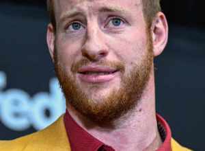 Washington Commanders quarterback Carson Wentz speaks with reporters during his introductory press conference at Inova Sports Performance Center in Ashburn, Va., March 17, 2022. (Photo by Brian Murphy, All-Pro Reels)