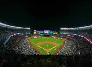 A picture of Yankee Stadium during a game between the Yankees and Pirates.