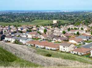 View of Antioch, California from Black Diamond Mines Regional Preserve. The Antioch Bridge on the San Joaquin River is visible in the background.