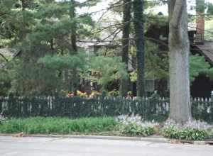 The Frederick Squires House is a combination of two late 19th century gable-front houses connected with a two-story wing by architect Frederick Squires in 1927.  (Source: