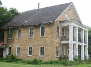 Front and southern side of the Jeremiah Wood House, located at 802 River Street in Sabula, Iowa, United States.  Built in 1866, it is listed on the National Register of Historic Places.