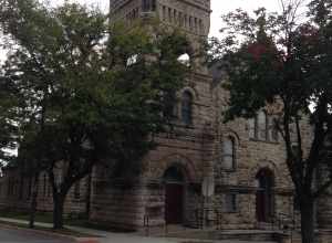 Photograph of Sacred Heart Catholic Church at the corner of Madison and 26th streets, Kansas City, Missouri.