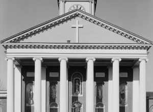 Basilica of Saint Joseph Proto-Cathedral in Bardstown, Kentucky. Approximate lat/long: 37°48′39″N 85°28′20″W﻿ / ﻿37.81083°N 85.47222°W﻿ / 37.81083; -85.47222 Front elevation (south). Image cropt to remove border.