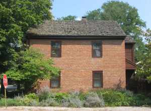 Front of the George Bentel House, located on the northeastern corner of the junction of Granary and Brewery Streets in New Harmony, Indiana, United States.  Built in 1823, it is listed on the National Register of Historic Places, and it is part of