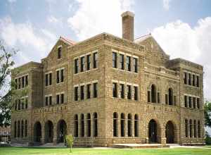 The Archer County, Texas courthouse located in Archer City, Texas, United States was completed in 1892, architect Alonzo N. Dawson (aka A.N. Dawson). The Romanesque Revival style structure was built of brown quarry-faced sandstone obtained from a