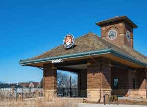 The Great Northern Bicycle Company at 425 Broadway, Fargo, North Dakota - rail station and clock tower building.
