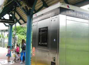 Looking east at platform of w:Liberty State Park (HBLR station) on a cloudy afternoon.