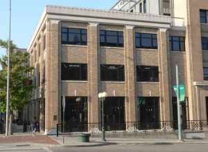 Haymarket District in Lincoln, Nebraska: Grainger Bros. warehouse, located at southwest corner of 8th and P Streets.  According to a plaque on the building, it was designed by the architectural firm of Fiske &amp; Dieman and constructed in 1906.
