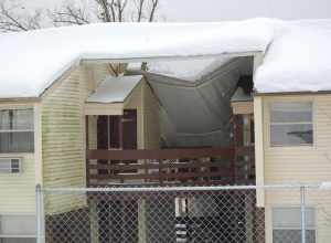 Members of the West Virginia Army National Guard traveled to an apartment complex in Summersville, W.Va., to assess the structural damage incurred after Hurricane Sandy brought over two feet of snow to the mountainous region. Soldiers assigned to