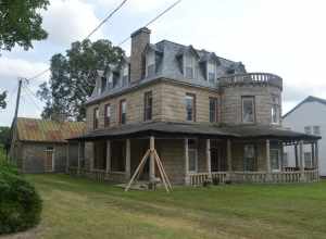Front and northeastern side of the Napoleon Bonaparte McCanless House, located at 619 S. Main Street (U.S. Route 29/U.S. Route 70/North Carolina Highway 150) in Salisbury, North Carolina, United States.  Built in 1897, it is listed on the National