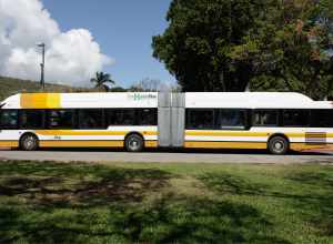 A TheBus New Flyer DE60LF parked at Sinclair Circle on the University of Hawaiʻi at Mānoa campus.