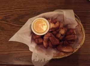 Starter with pieces of pretzel and a mustard honey dip in Schmidt's Sausage Haus in Columbus, Ohio