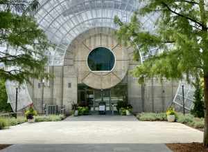 Built in 1983-1985, this Modern building was designed by Conklin and Rossant as part of the construction of the Myriad Botanical Gardens, which began construction in 1971.  The building consists of a large cylinder that is 224 feet (68 meters) long